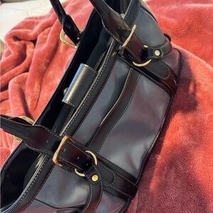 Elegant Brown Leather Handbag with Gold Accents